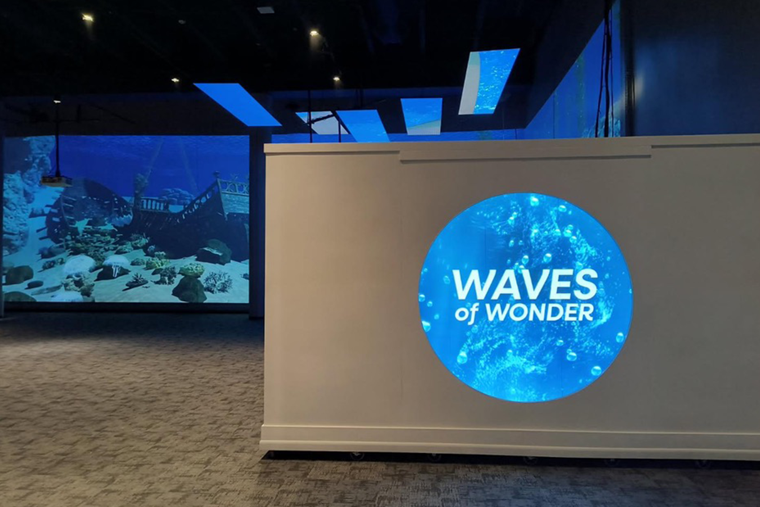 To help light control and also act as an additional canvas for the events team, we built a large digital wall element at the entrance.