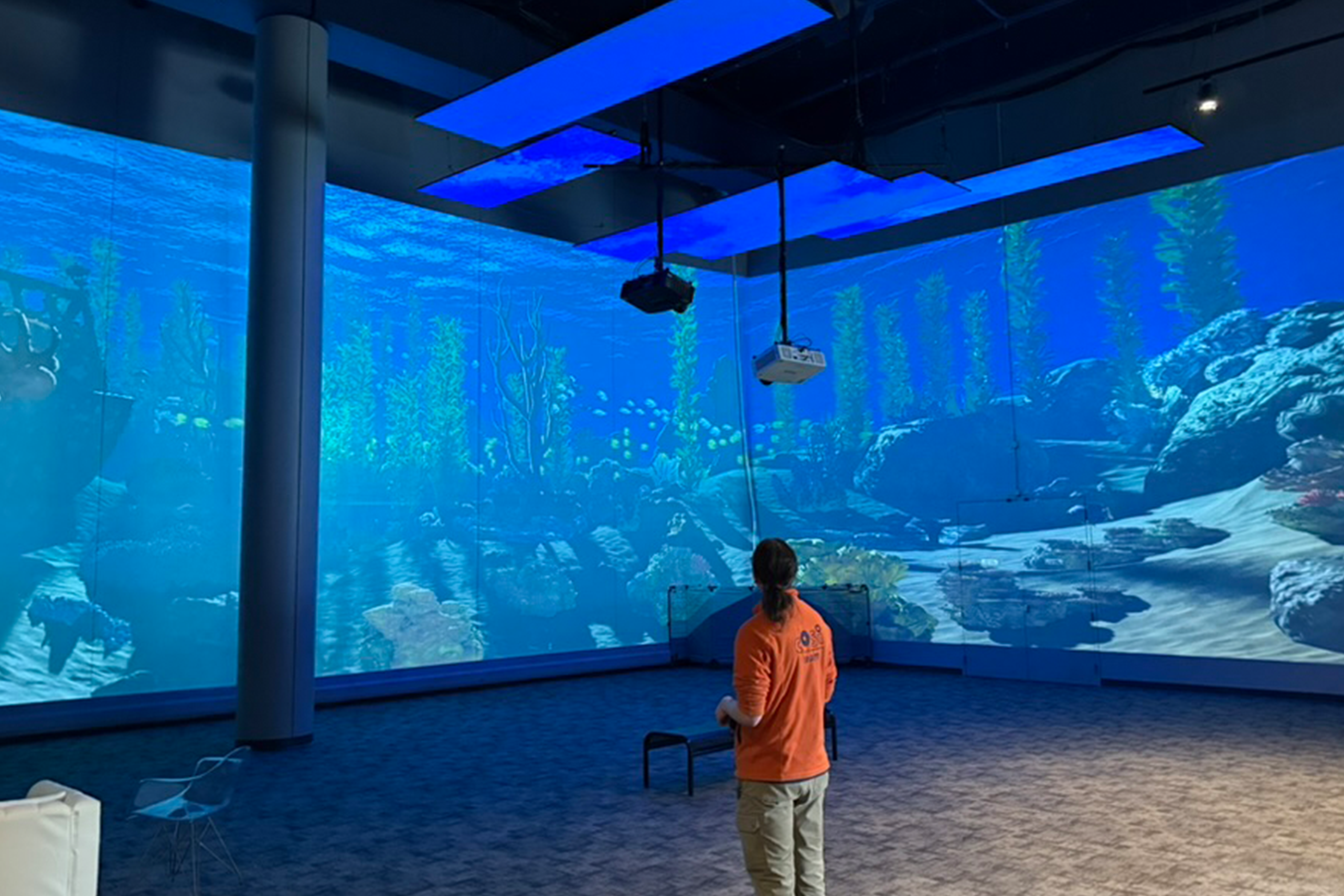 We utilized existing columns to help create physical depth and scale in the space — it’s a digital aquarium and the walls are the glass.