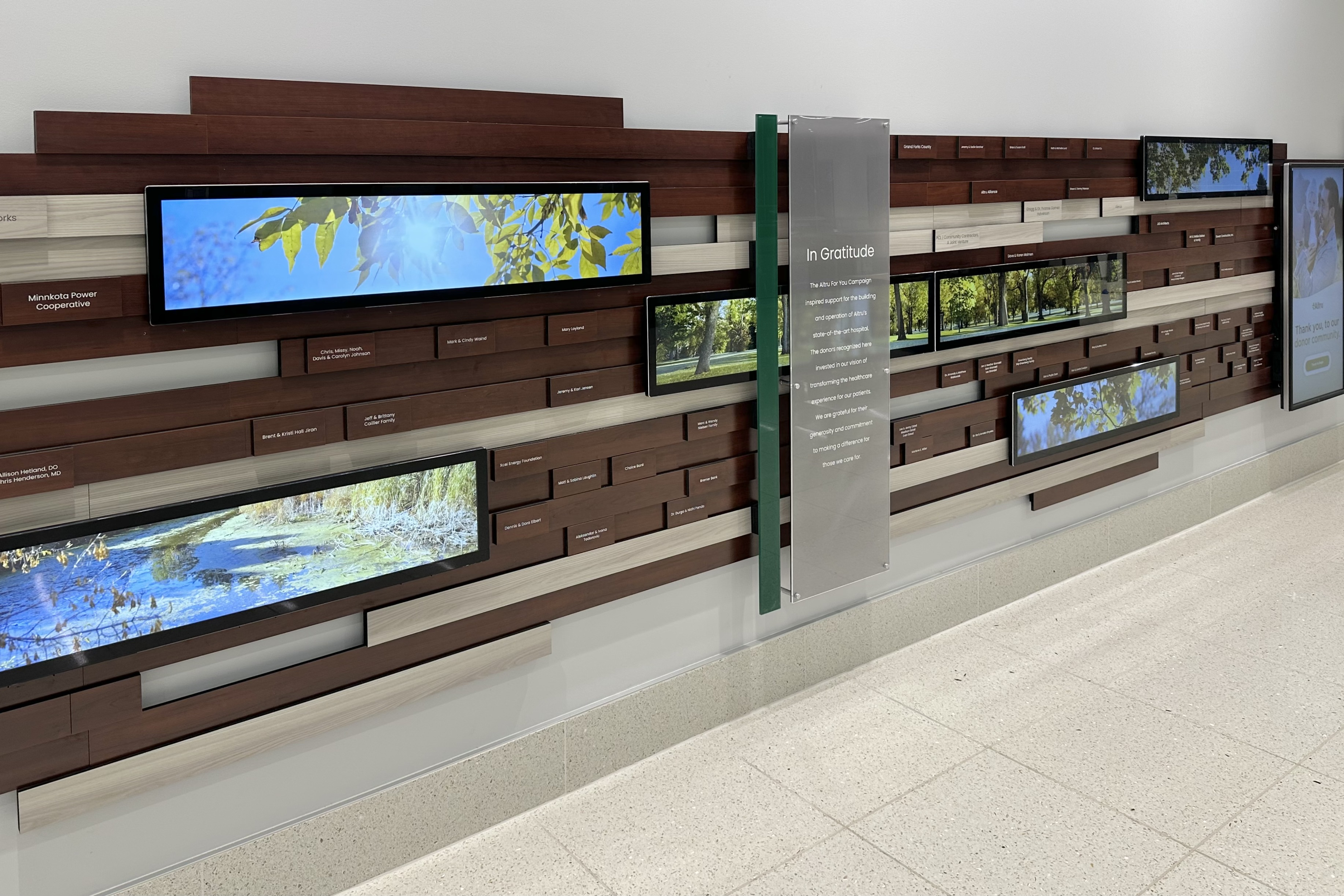 We created custom and integrated media screens to create the “windows” in the wall.